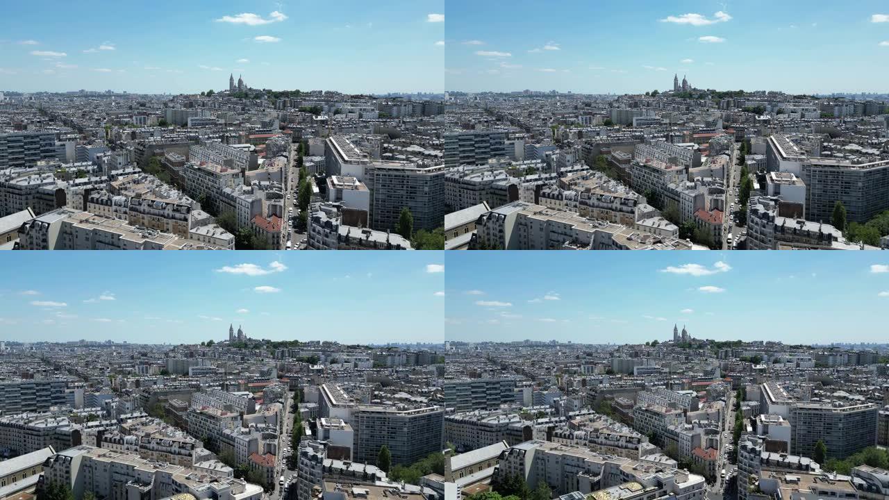 巴黎第17区或第17区，以蒙马特和圣心大教堂或圣心大教堂为背景。空中向后。复制空间的天空