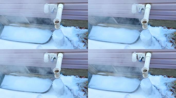 冬季工作炉的俯视图，排气管上积冰和霜冻。