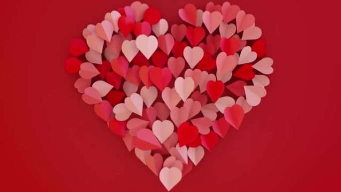 小心脏做的大心脏像蝴蝶一样飘动。4k无缝循环视频。2月14日情人节，特殊的日子概念。