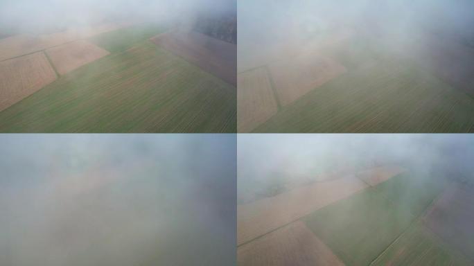 在耕地上方的云层中飞行。飞入云层的摄像机视图。在云中飞行。阳光普照的云。版本4
