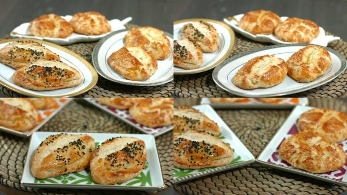 传统的土耳其糕点概念，pogaca，百吉饼，在乡村餐桌上，著名的烘焙产品