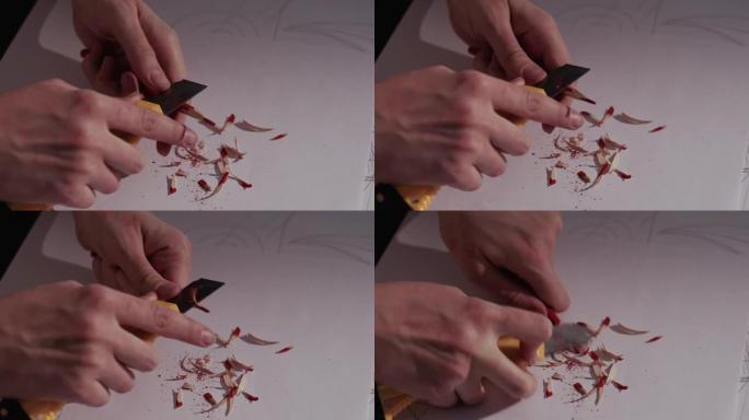 艺术家削尖铅笔特写展示笔屑