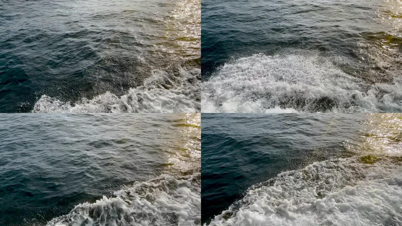 当船滑过苏必利尔湖时，低头俯瞰强大的尾流和海浪