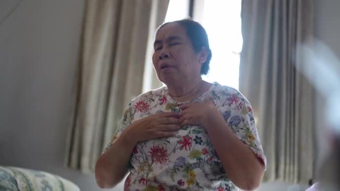 患有心脏病和胸闷的亚洲老年妇女。