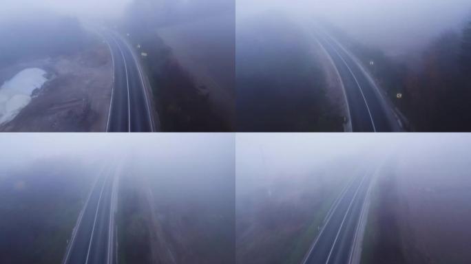 漫漫长路的无人机视图被雾覆盖