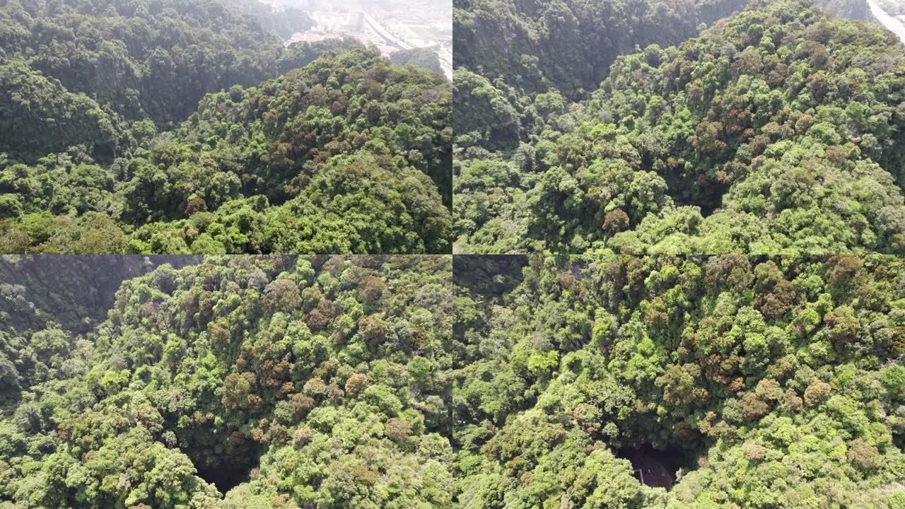 马来西亚吉隆坡。在黑风洞上方的森林中开孔，无人机视图。