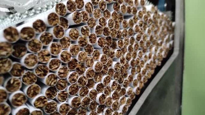 一群香烟来自香烟制造商，传统香烟制造商的传送带车道