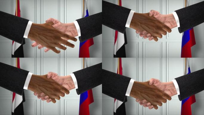 也门和俄罗斯的协议握手，政治例证。正式会议或合作，商务见面。商人和政客握手