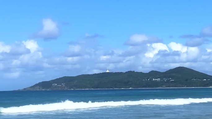 海岬灯塔背景海滩