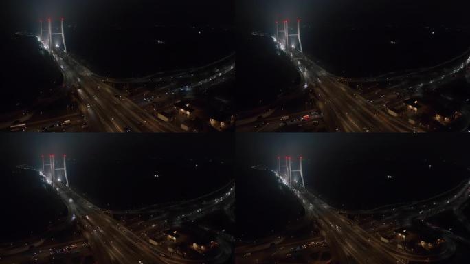 空中交通城市桥路夜间汽车行驶悬索桥