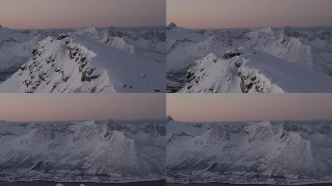 在Senja山脉拍摄日落的无人机