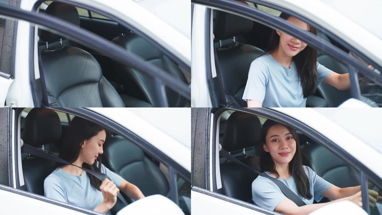 亚洲美女司机开车前系好汽车安全带。迷人的年轻女孩带着幸福和自信在车内系好安全带。保护安全驾驶理念。