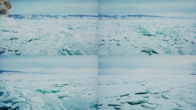 贝加尔湖，薄冰碎片。蓝色的雪驼峰。一种罕见的自然现象。美丽的冬季风景。俄罗斯西伯利亚贝加尔湖。无人机
