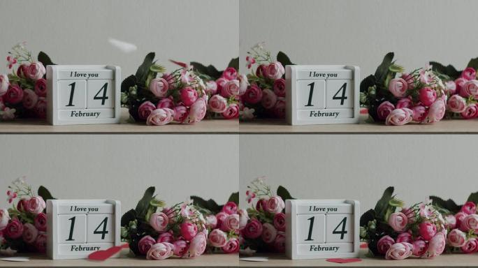 带有日期2月14日和铭文的日历，我用鲜花爱你。