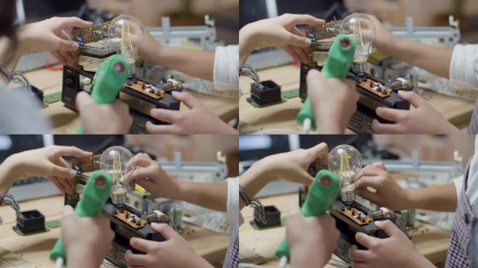 两个孩子构建电机制的特写镜头