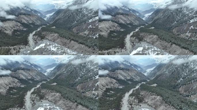 空中无人机视图日出风景，早晨雾和雪在童话草甸国家公园与拉赫希奥特冰川在南加帕尔巴特山，喀喇昆仑山，喜