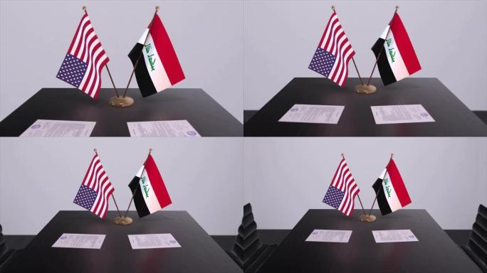 伊拉克和美国在谈判桌上达成外交协议。商业和政治动画。国旗，外交协议。桌上的纸质文件。国际协议。
