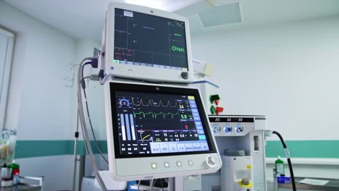 现代肺通气系统的双重屏幕。监视器显示了患者病情的各种参数。