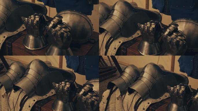 中世纪盔甲、手套和头盔的特写镜头