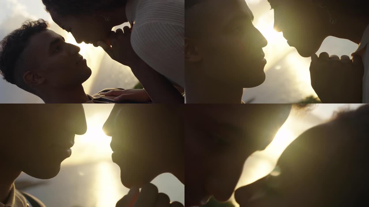 日落时的浪漫约会。两个非洲族裔青少年互相拥抱。年轻的爱。相机旋转效果