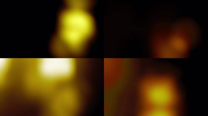 屏幕项目叠加的抽象循环橙色泄漏闪耀动画背景。4k无缝循环美丽的光泄漏反射黑色背景与黄色橙色光泄漏集合