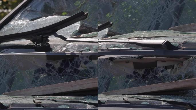 汽车挡风玻璃上一块木板的特写镜头。