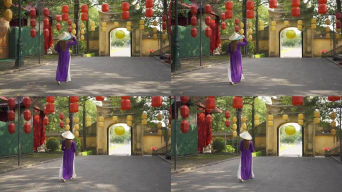 越南河内城市城镇当地寺庙里的亚洲越南女女孩肖像，灯花灯节。人们的生活方式。