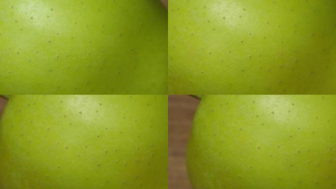 青苹果皮，特写。详细的苹果质地。