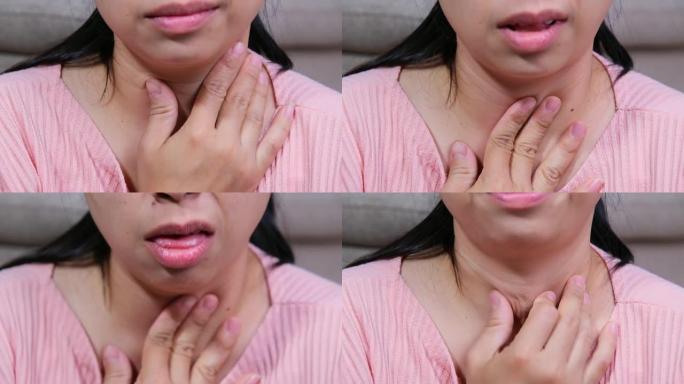 亚洲妇女触摸痛苦的脖子，并在家里因流感而感到喉咙疼痛。健康和医学概念。