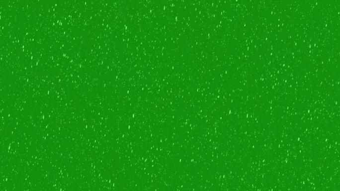 绿色屏幕上孤立的落雪。