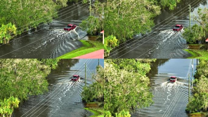 在佛罗里达州居民区，用移动的车辆淹没了美国街，并被水屋包围。飓风伊恩自然灾害的后果