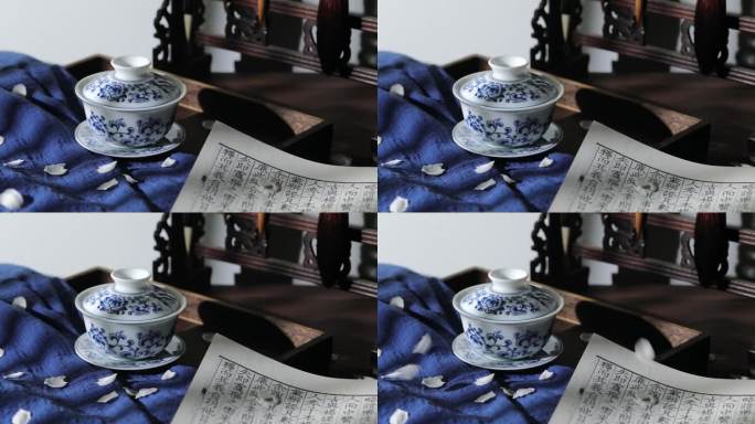 中国风茶杯书籍花瓣