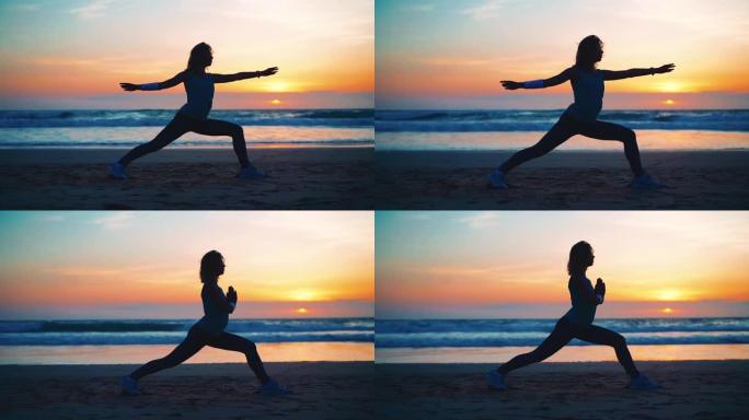 剪影女人练习瑜伽战士姿势冥想与暑假海滩的幸福和放松。平静的女性瑜伽运动冥想海洋海滩与日落黄金时间。