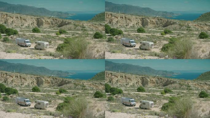 焦点吸引停在西班牙卡波德加塔的两辆旧露营车