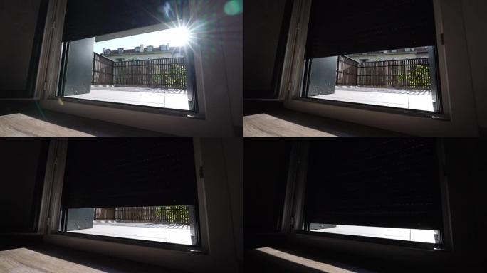 用镜头照射阳光关闭电动百叶窗。智能电动车窗向下的低角度。现代自动化