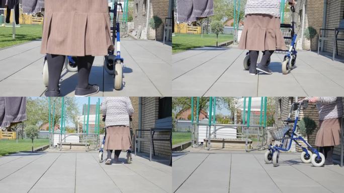 一位老年妇女带着助行器走在街上。Rolator