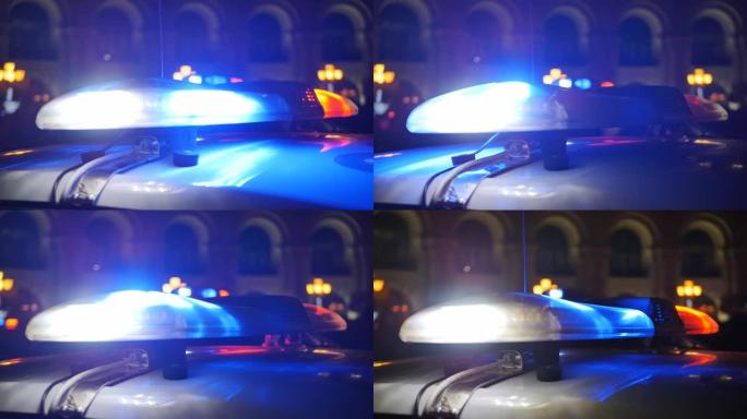 夜间巡逻车上警察红蓝闪光机的特写镜头。警察闪光灯的红色和蓝色灯打开，以告知其他人警察在场