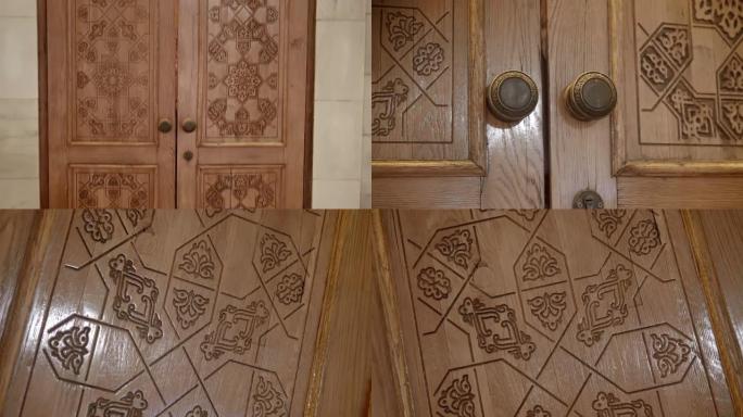 清真寺的木门上装饰着图案和阿拉伯文字