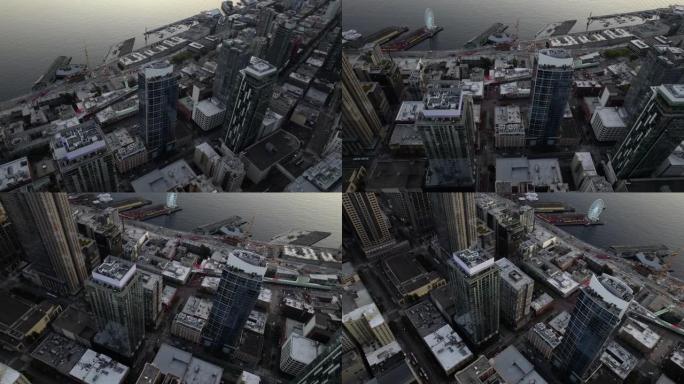 俯瞰西雅图派克松零售核心区海滨公寓的鸟瞰图，美国华盛顿州黄昏-盘旋，无人机拍摄