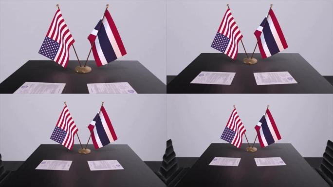 泰国和美国在谈判桌上达成了外交协议。商业和政治动画。国旗，外交协议。桌上的纸质文件。国际协议。