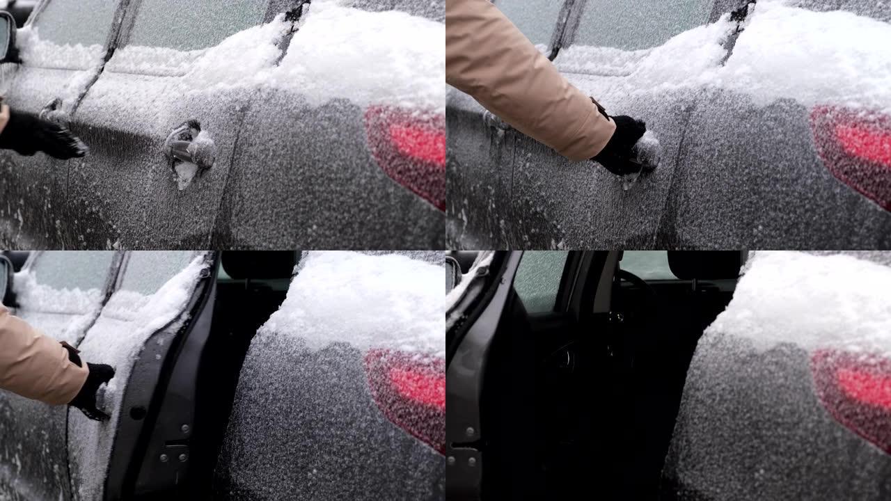 男子手试图打开冰冻的车门