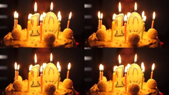 小女孩十岁生日派对在家准备以快乐的积极情绪吹灭蛋糕上的蜡烛