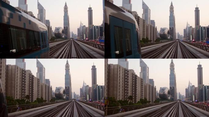 迪拜，阿联酋-10月10日，2022: 迪拜铁路地铁列车，未来博物馆和日落天空背景