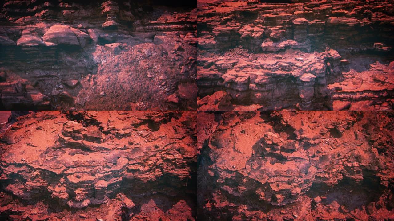 红色星球火星干旱山脉的无人机飞行视图