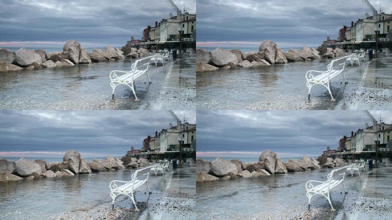 在暴风雨的日子里，LD长凳沿着洪水泛滥的海岸