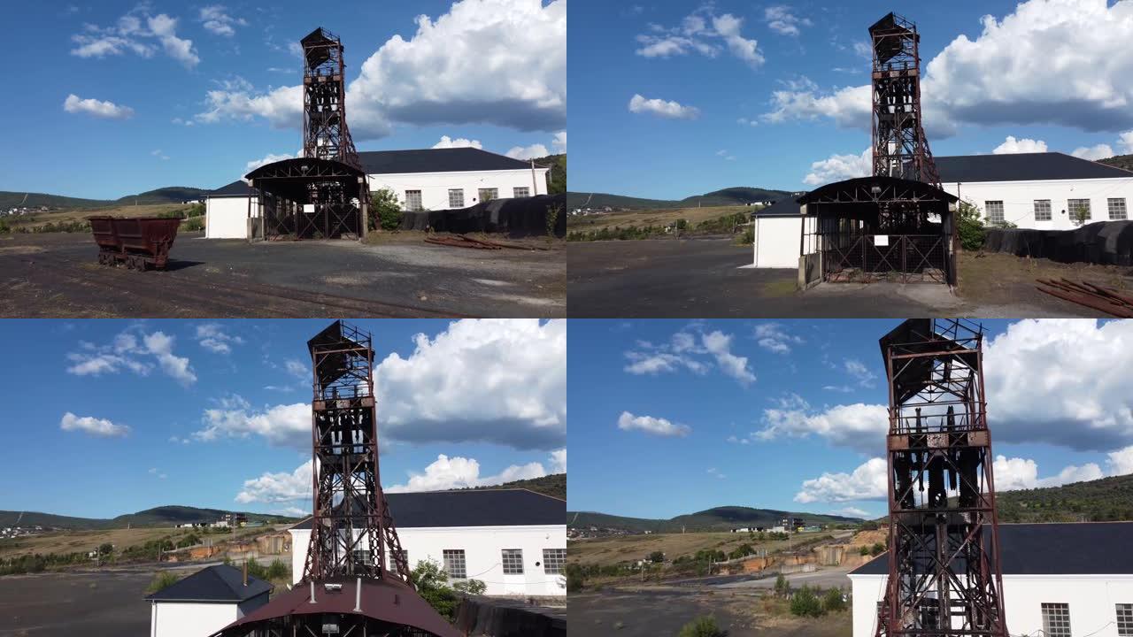在Fabero (西班牙) 鸟瞰图中，古老的矿塔和一个名为Pozo Julia的地下煤矿的建筑物