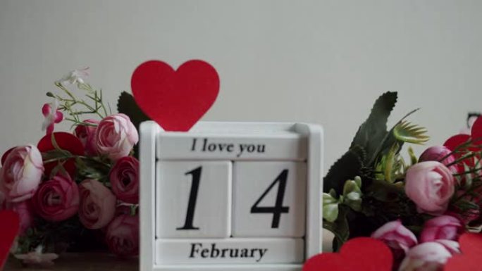 日历上有日期2月14日和我爱你的铭文，