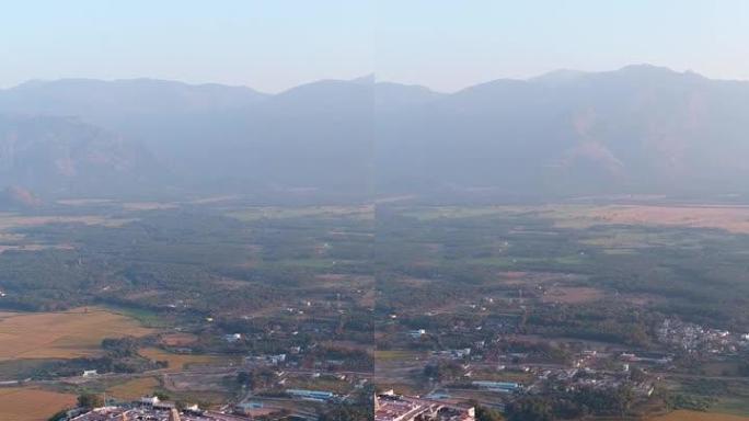 山背景帕拉尼山上神圣印度教寺庙航拍的垂直视频