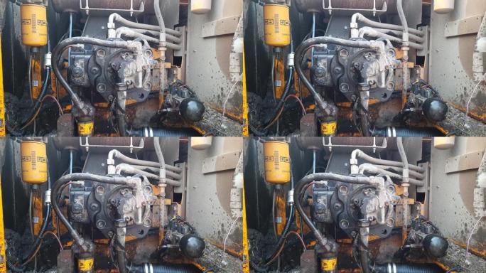 挖掘机中的液压主泵。用于道路的钻机中控制压力的液压系统-液压泵-设备的液压控制系统。