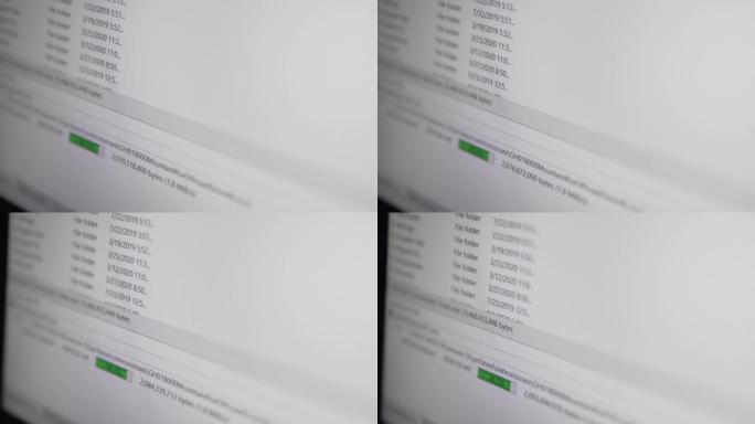 显示文件上传或下载栏进度的现代数字设备的屏幕。现代技术。信息交换或转移。高速互联网，选择性聚焦
